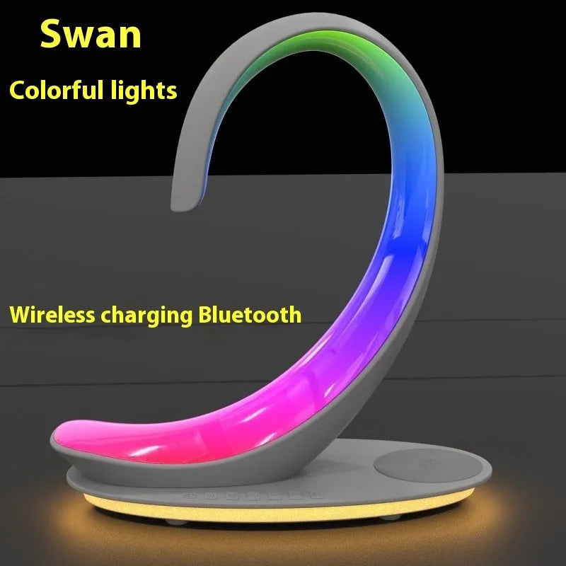 White Swan animal figure desktop wireless charger with Bluetooth speaker and colourful atmosphere light.