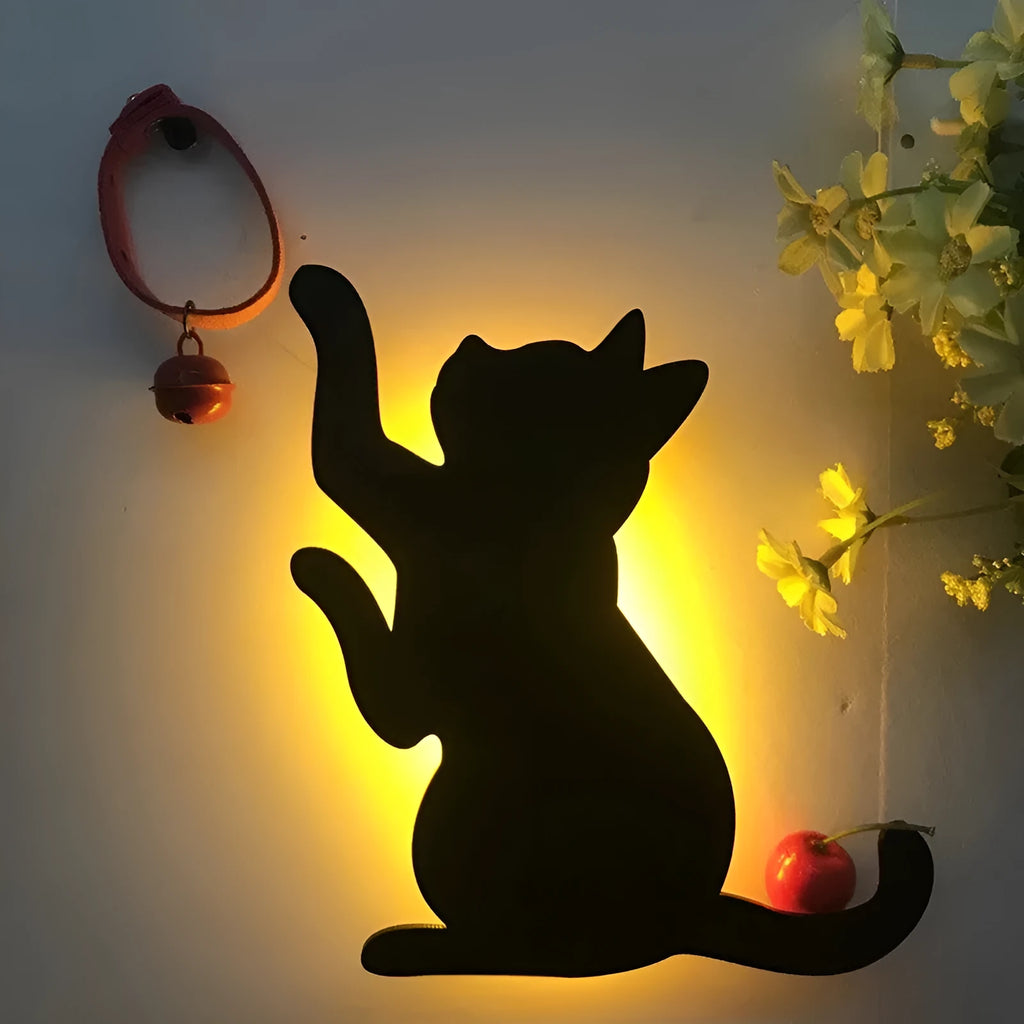 LED cat-shaped night light with sound sensor, warm yellow glow, acrylic shade, wall-mounted in a bedroom
