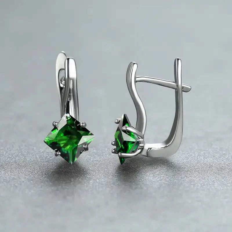 Women's copper earrings with a diamond design and inlaid zircon treatment in blue, green, or colour.