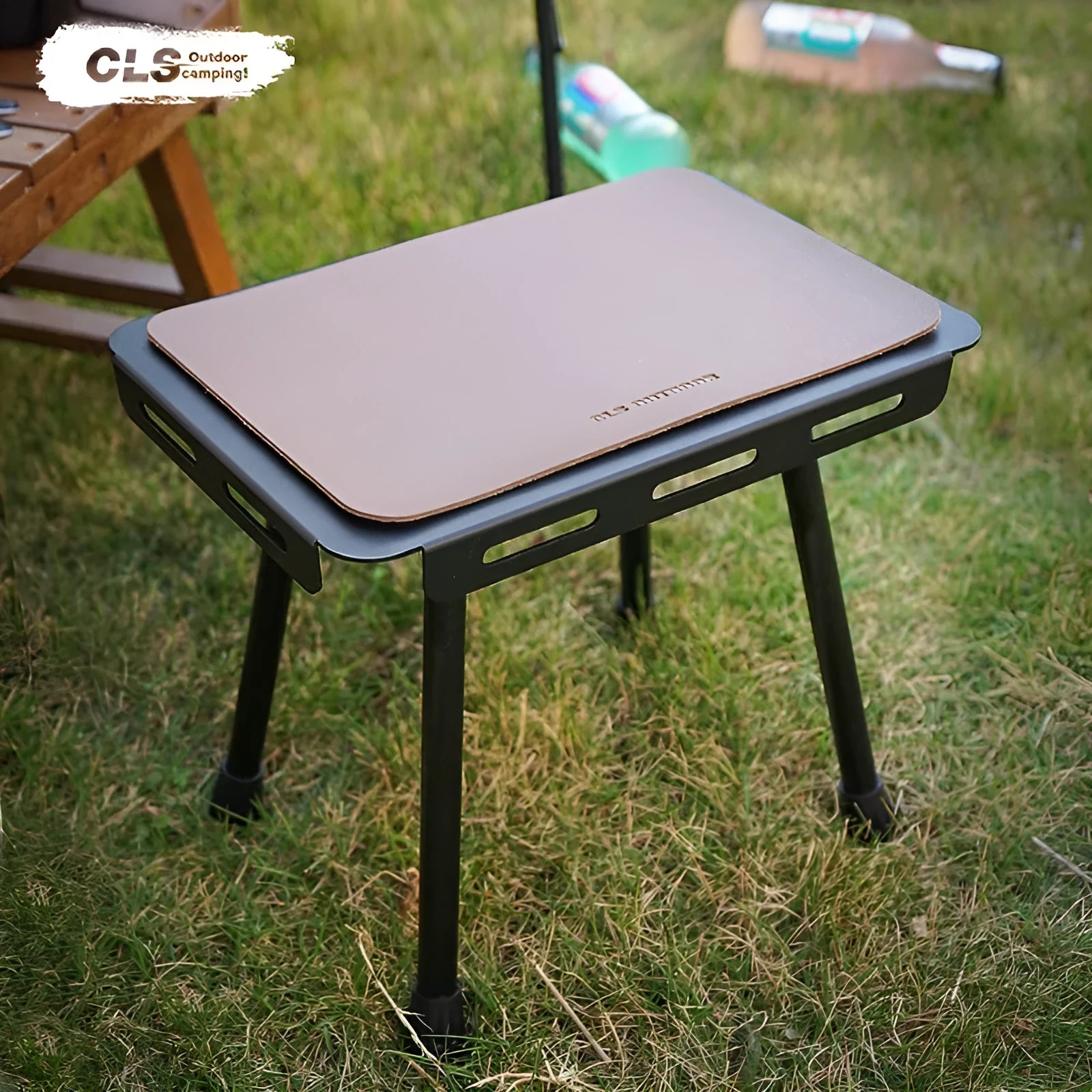 CLS aluminium dual-use camping stool shown in Army Green, folded and with storage bag.