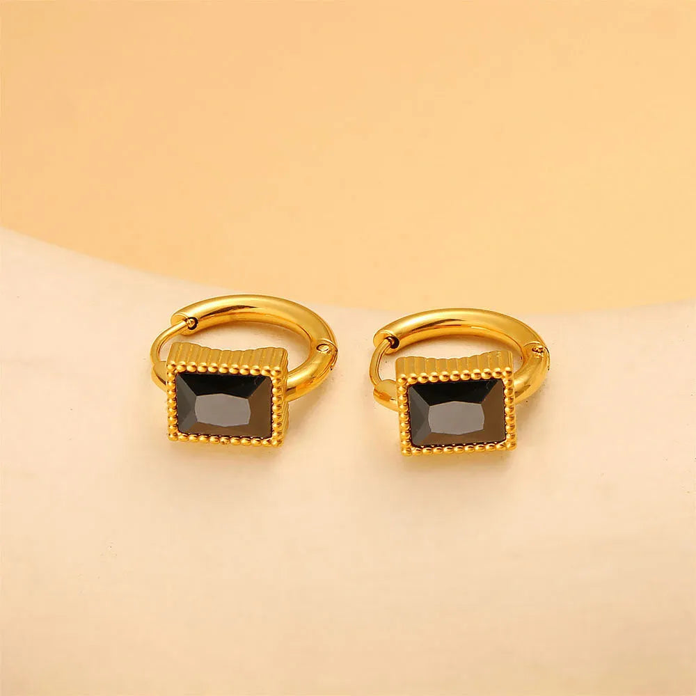Geometric stainless steel earrings with a square zircon, available in white, black and green.