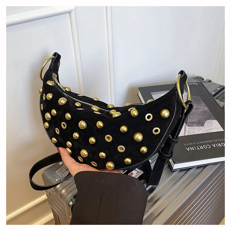 Retro rivet shoulder bag in frosted imitation buckskin with single strap and sewing line detail on a white background