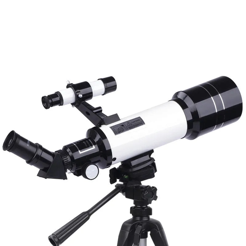 Dark blue children's astronomical monocular telescope on a tripod with optional mobile phone holder attached.