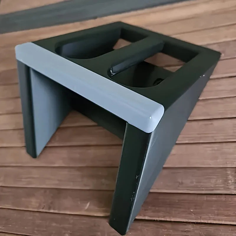 Black punk-style plastic pistol stand for gun display