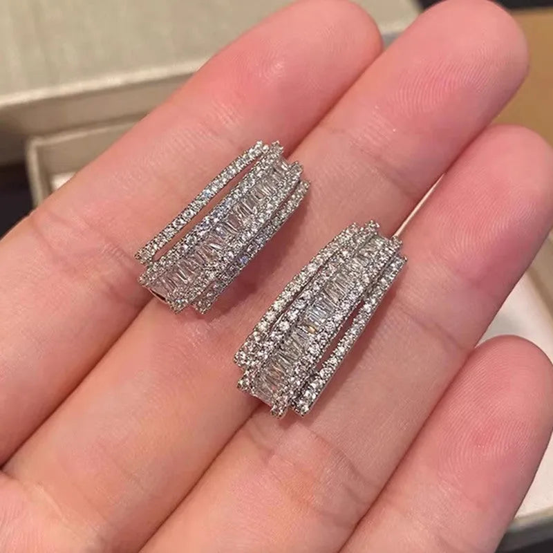 Women's geometric copper stud earrings with white gold plating and small zircon stones
