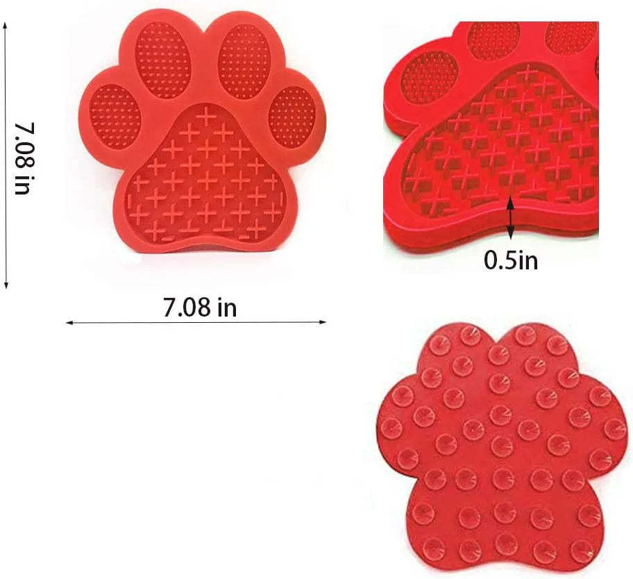Blue bone-shaped silicone dog licking mat with suction cups on back for wall mounting during bathing.