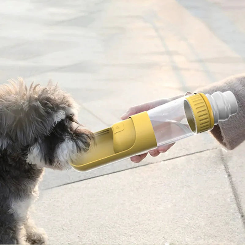 Dark blue portable dog water bottle with built-in bowl and leak-proof lock.