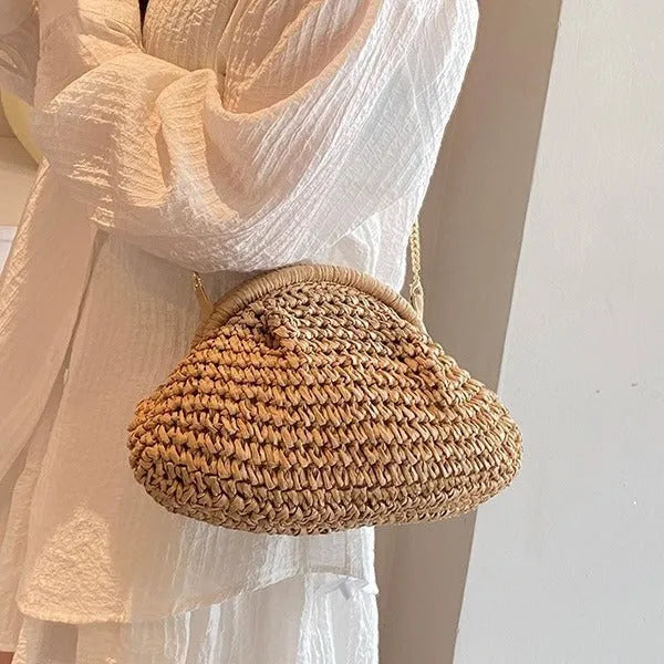Women's khaki shell-shaped straw shoulder bag with a chain strap detail