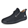 Men's black casual leather boots with a front side zipper and a hand-stitched rubber sole.