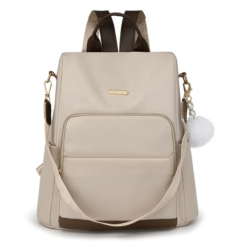 Colour block large capacity anti-theft backpack in beige with oxford cloth exterior and three-dimensional front pocket