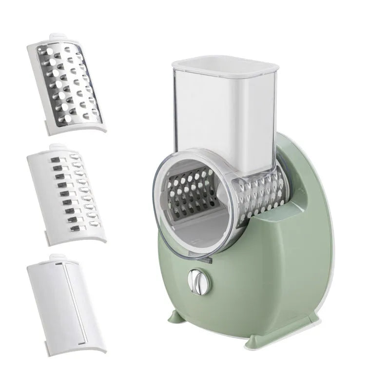 White electric vegetable slicer with suction base and interchangeable blades on kitchen counter
