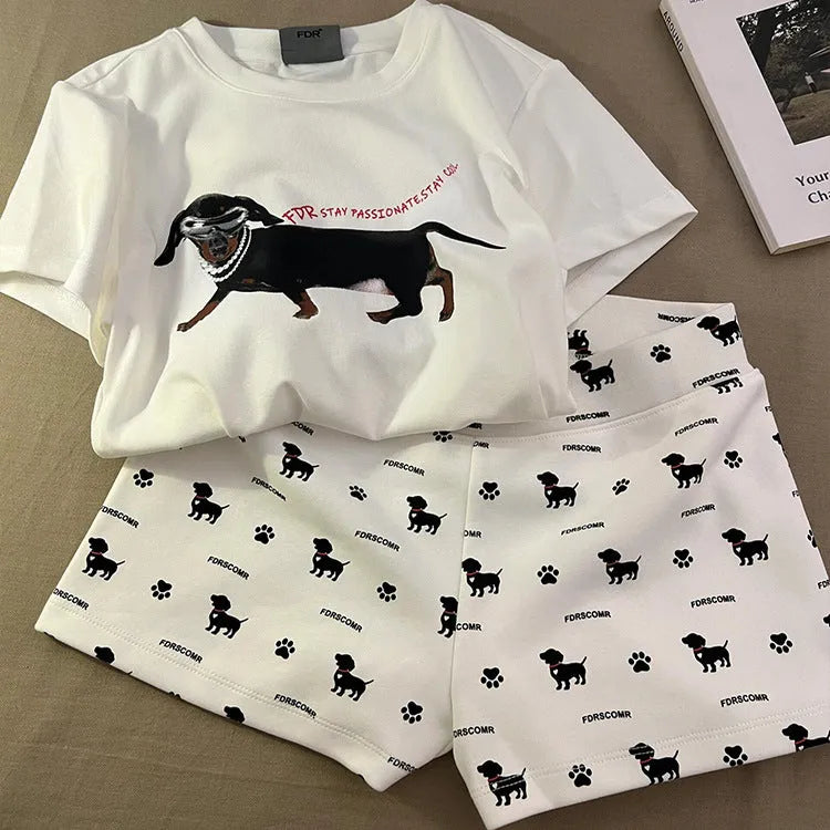 Girls short sleeve pyjama set with sausage dog print and sunglasses design in polyester