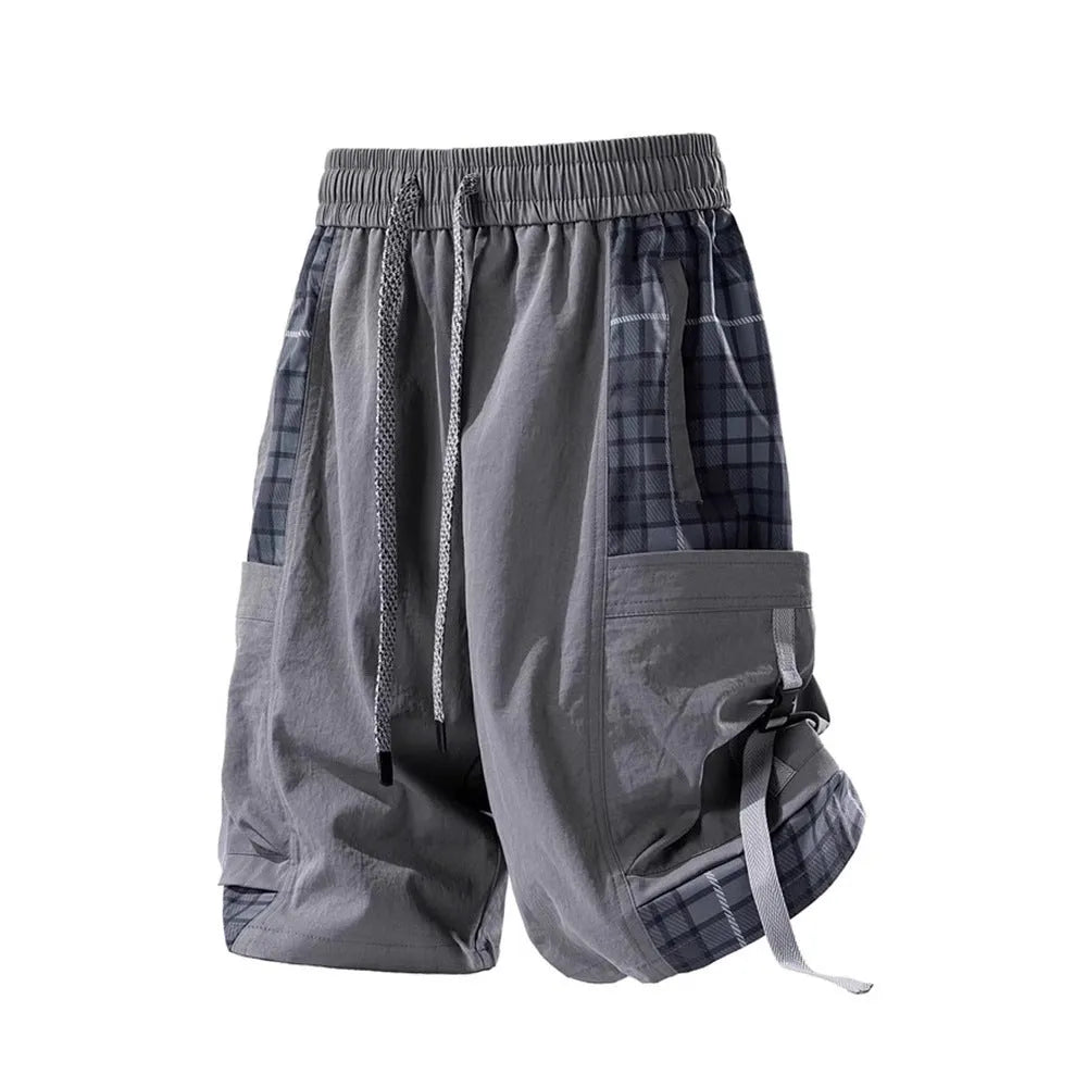 Men's black cargo shorts with plaid stitching pattern, loose fit design, and cargo pockets