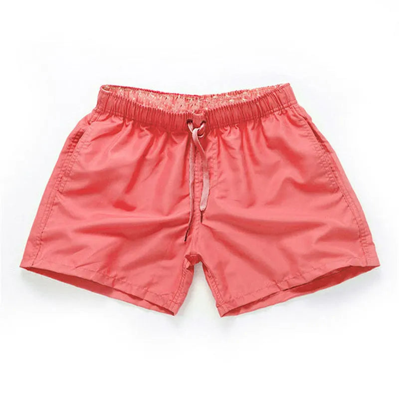 Men's straight-leg beach shorts in polyester fabric, shown in multiple colour options.