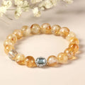 10mm geometric-cut citrine bracelet with hand-ground surface texture on wrist