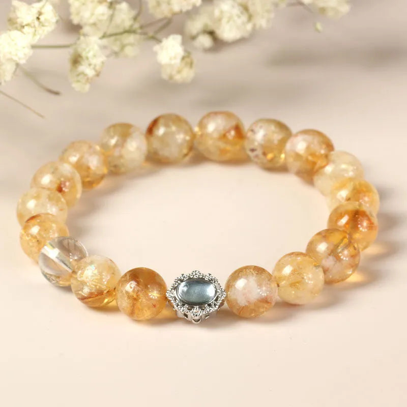 10mm geometric-cut citrine bracelet with hand-ground surface texture on wrist