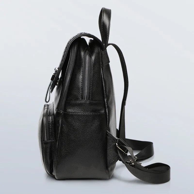 Genuine leather women's backpack in blue with multiple compartments and waterproof function