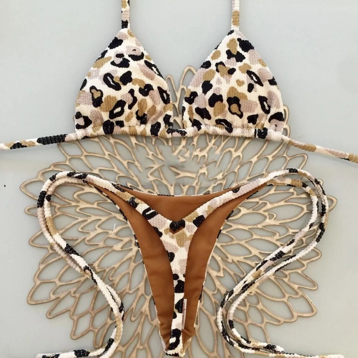 Women's printed nylon bikini swimsuit with cotton-lined briefs in three colour options