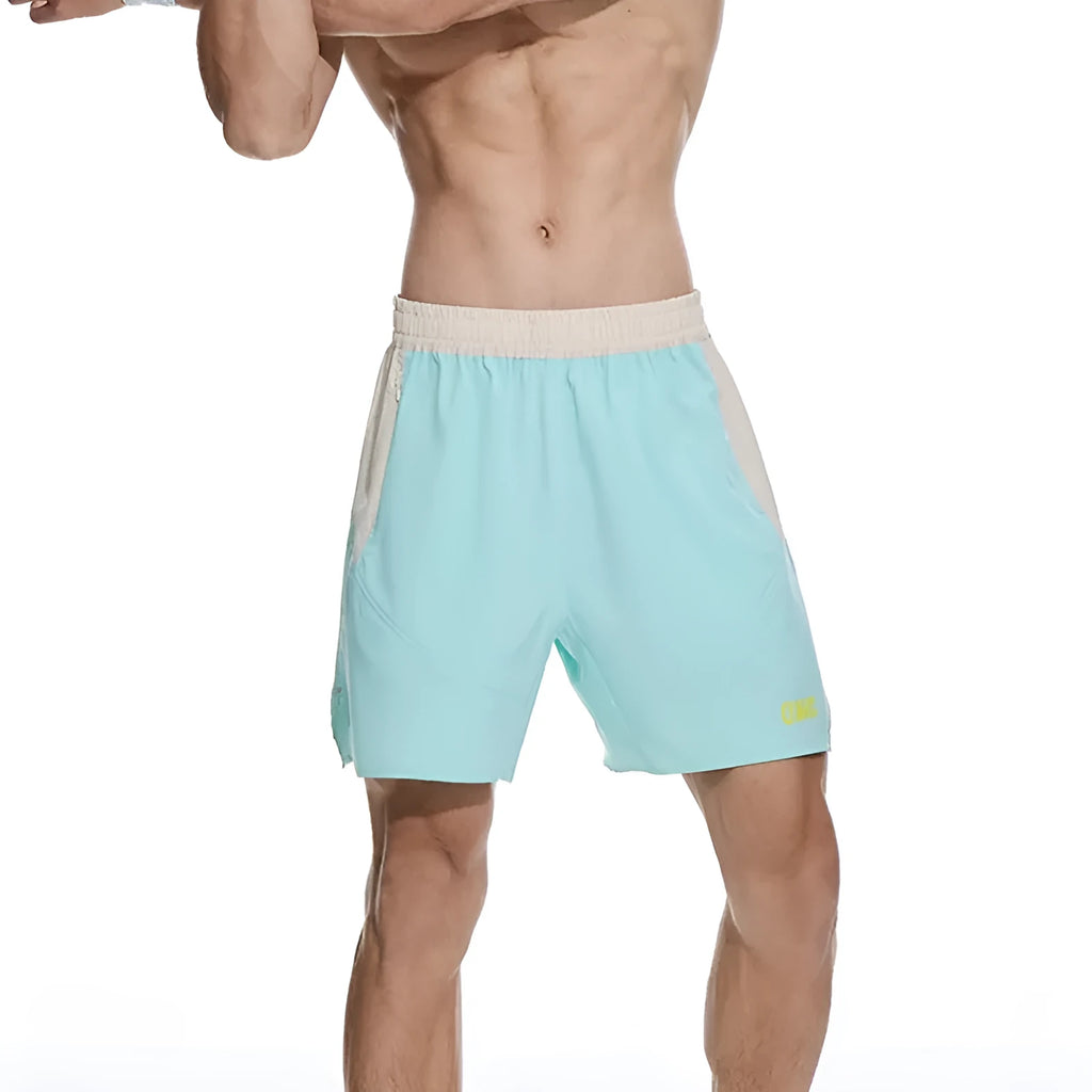 Men's loose fit workout shorts in dark rock ash colour with elastic waistband and lace-up front for gym training