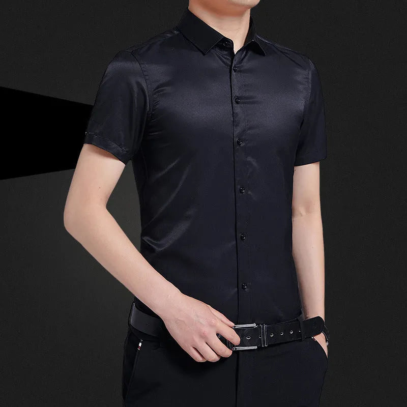 Men's solid colour non-iron short sleeve shirt in white, black, light blue, and pink, loose fit cotton polyester blend