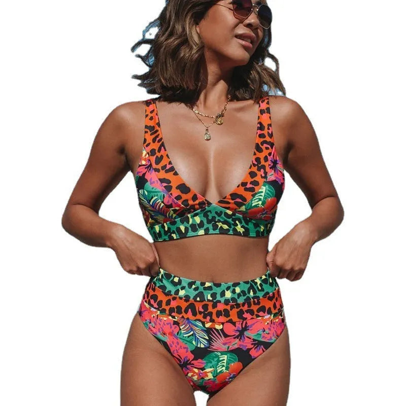 Women's floral print high-waisted bikini swimsuit set on a mannequin.