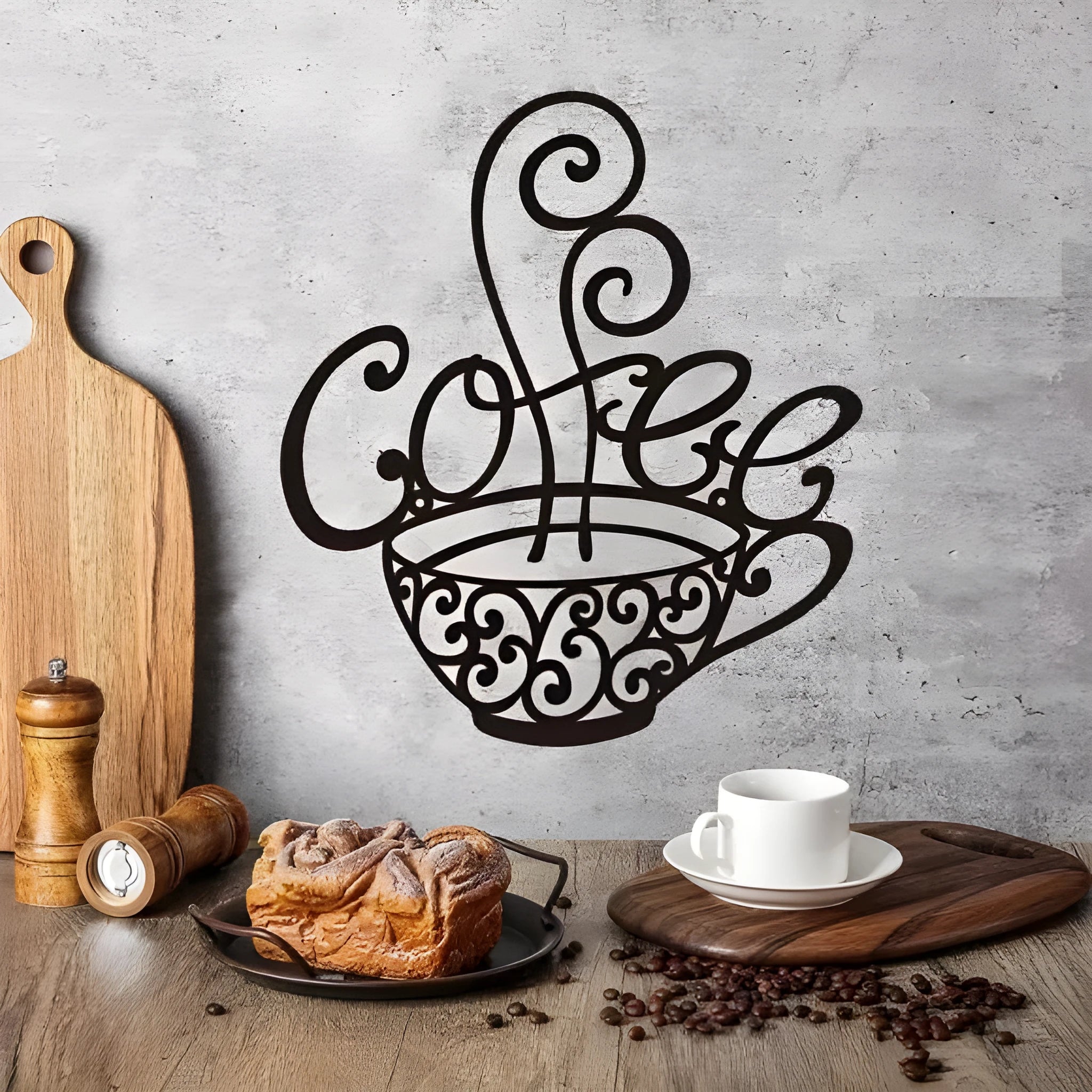 Black wrought iron wall decoration with English letters silhouette design measuring 26x28cm