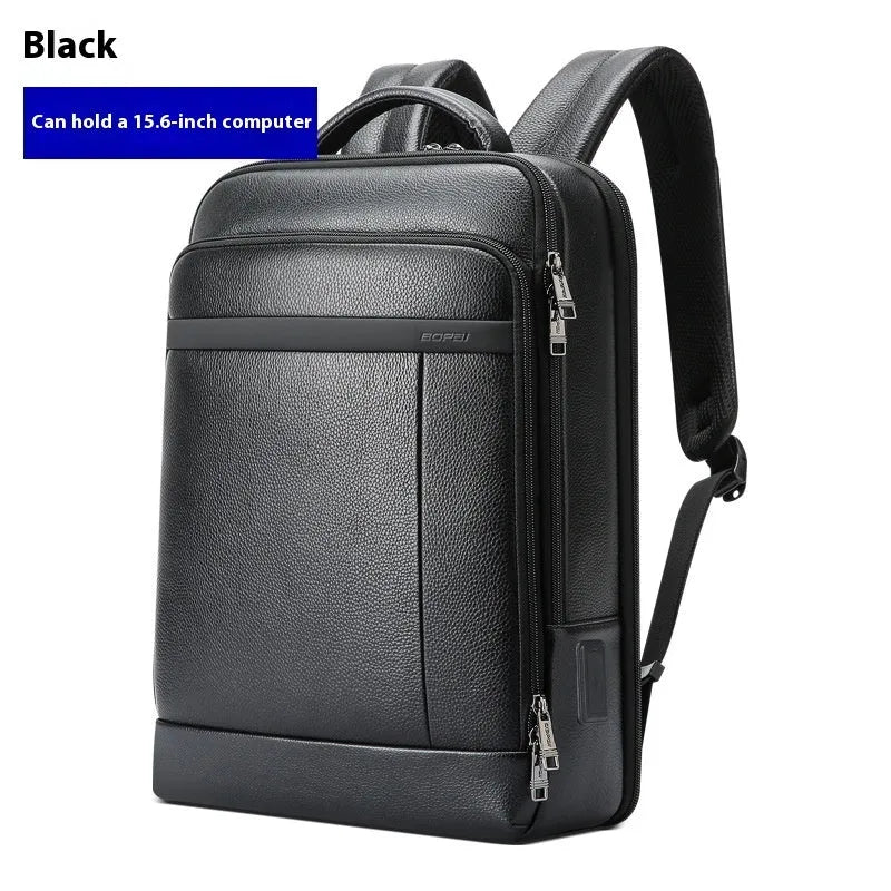 Black genuine cowhide leather business commuter backpack with USB port and curved shoulder straps.