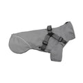 Waterproof dog raincoat in camouflage colour with two leg openings for chest and back coverage, polyester material, casual style