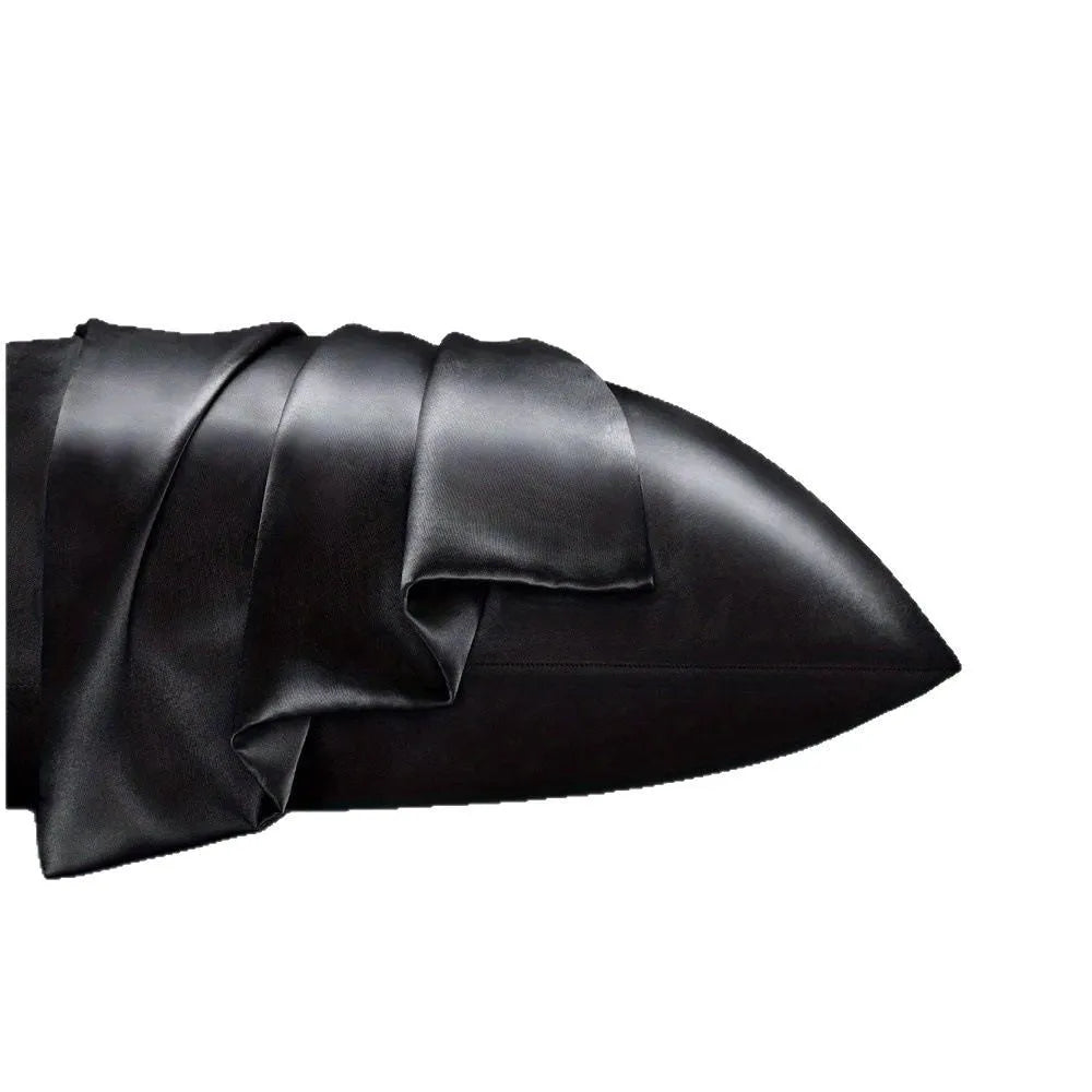 A pair of solid-colour satin cloth pillowcases in one of 13 available colours, shown in a standard pillow size.
