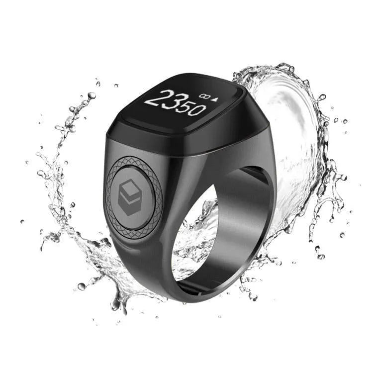 Zikr1 metal smart ring for Tasbih counting on a finger, showing its OLED display and single button.
