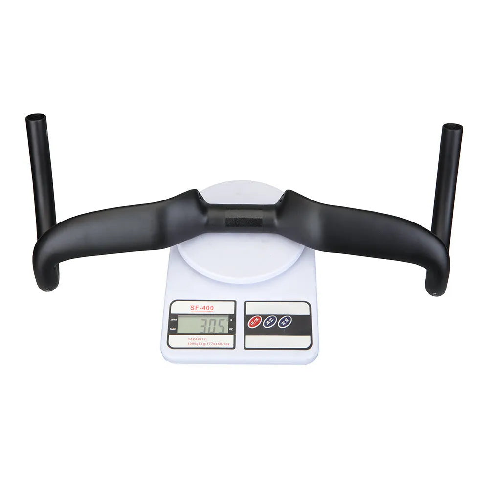 Black carbon fibre bicycle handlebar showing bent shape, with 31.8mm clamp area.