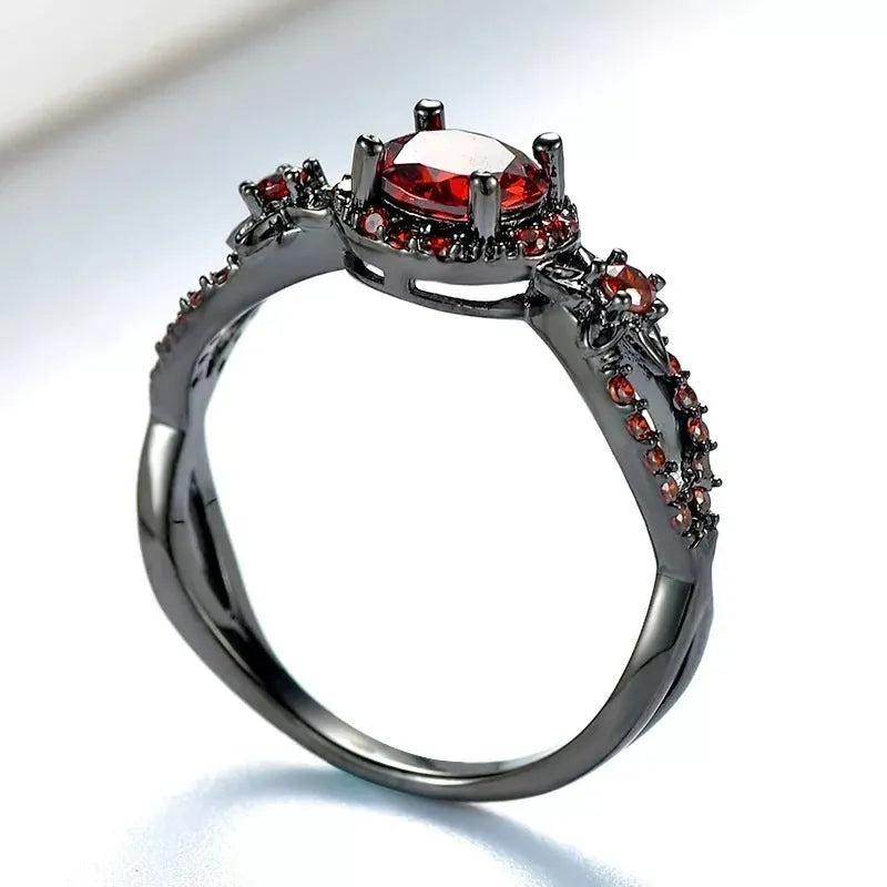 Black gold plated wave shaped ring with red zircon stone on copper band for women Korean style