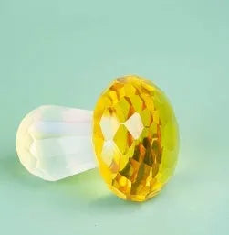 Modern geometric white crystal mushroom decoration in transparent, green, red, or yellow, 40mm wide.