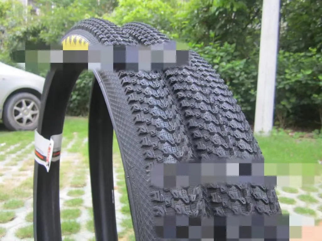 Ultralight puncture proof mountain bike tyre shown in multiple sizes for 26, 27.5 and 29 inch wheels.