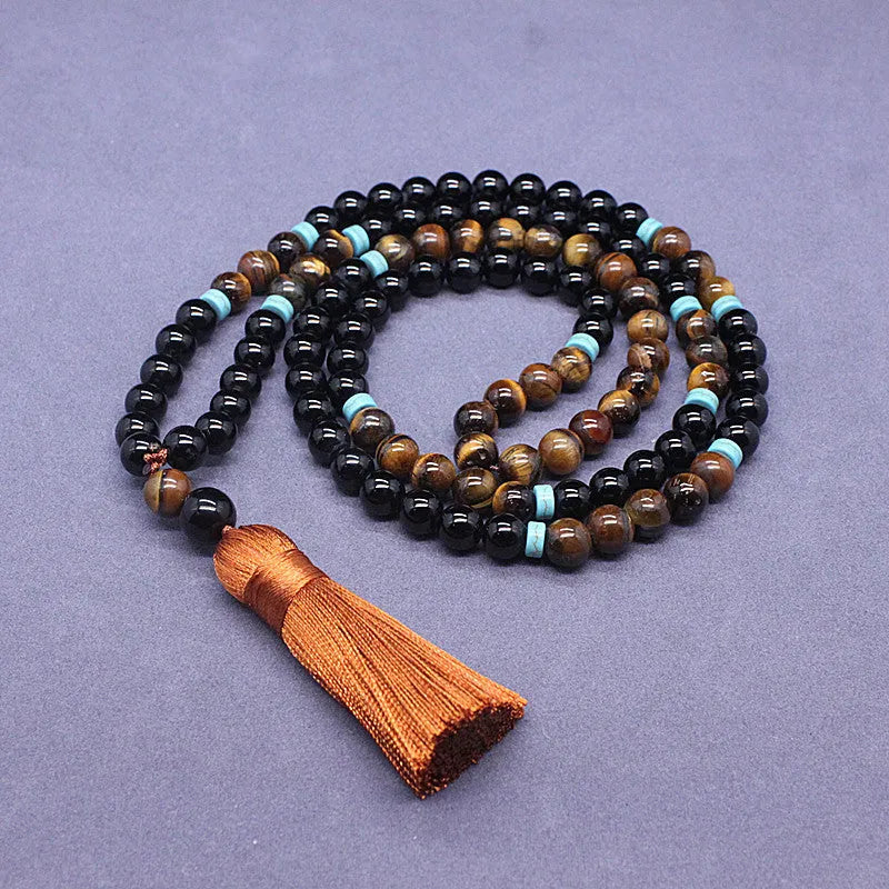 Black agate bracelet and matching necklace with a Tiger pattern stone pendant.
