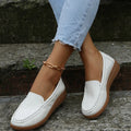 Women's PU leather flat shoes with round toe and rubber sole in black, white, red, blue, and orange colours.