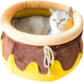 Pink honey pot-shaped cat sofa bed with a large soft interior and a removable cushion.