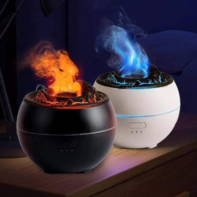 Round white ultrasonic flame aroma diffuser with water tank on desk