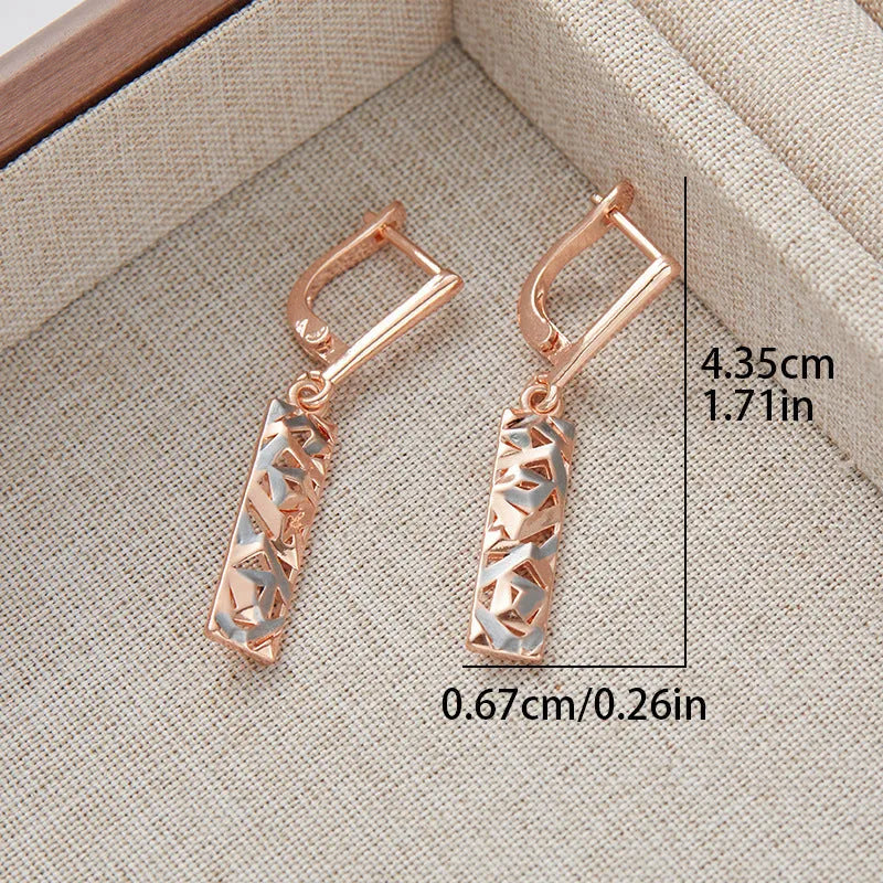 Rectangular two-tone hollow stud earrings with electroplated finish and geometric design