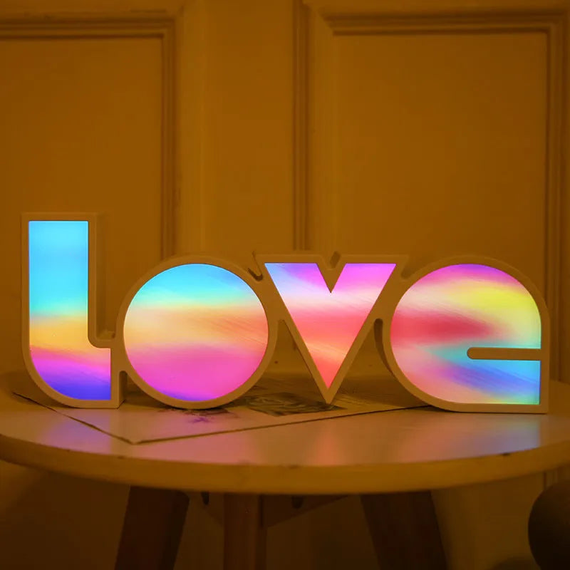 Colourful LED LOVE word light with rainbow halo lampshade for romantic decoration.