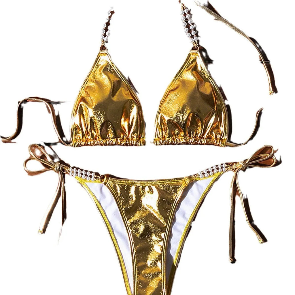 Gold women's halter bikini with front lace-up tie and decorative pearl chain detail.