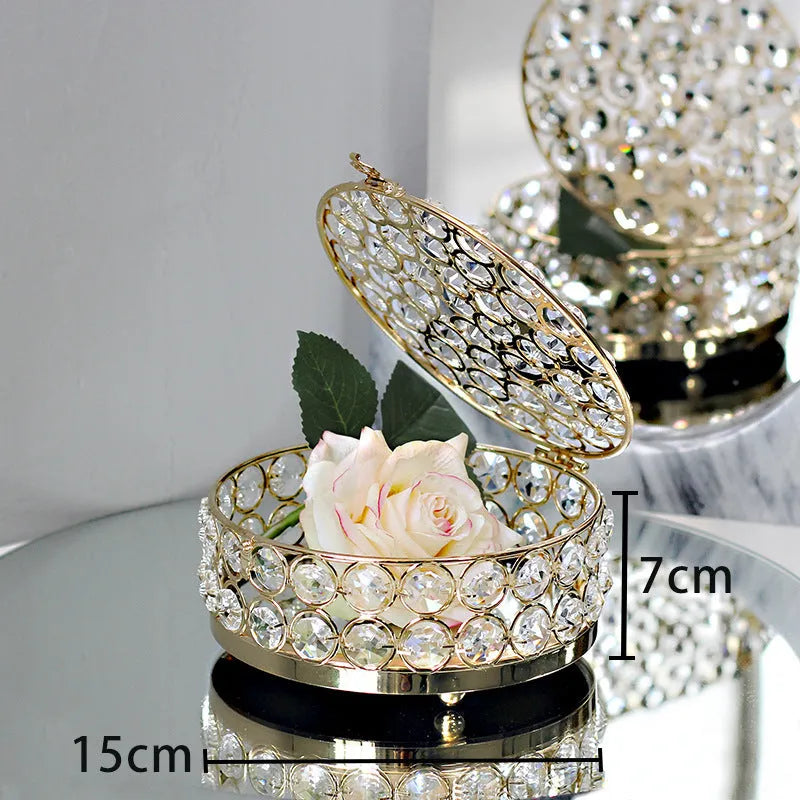 French gold iron frame transparent crystal glass jewelry storage box on a table
