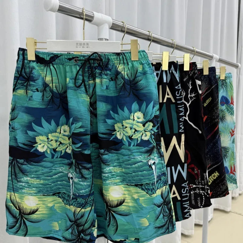 Men's loose fit beach trousers with floral pattern and elastic waistband for summer wear