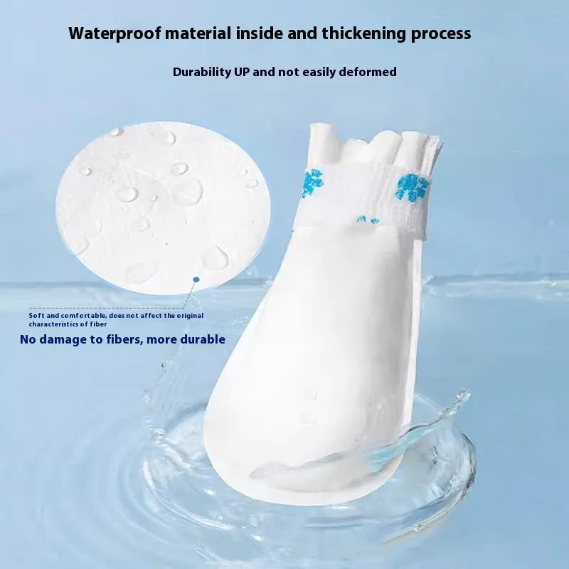 White disposable waterproof pet shoe covers with non-slip soles for small and medium dogs