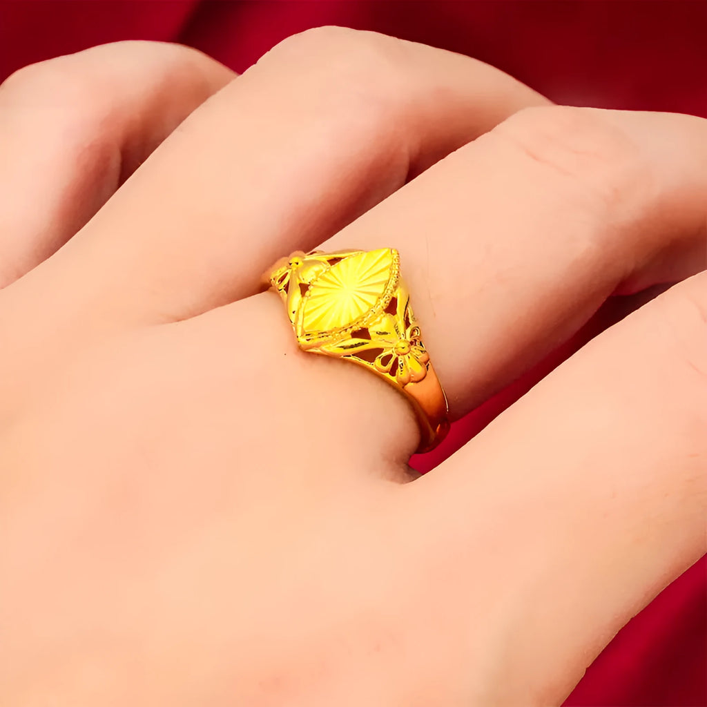 Gold electroplated brass ring with geometric open diamond flower design