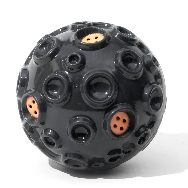 Colourful durable dog chew ball with textured surface and internal squeaker for aggressive chewers