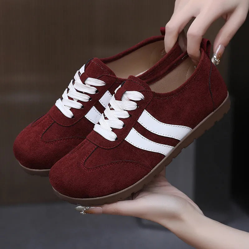 Women's vintage canvas sneakers with soft rubber soles in dark red colour