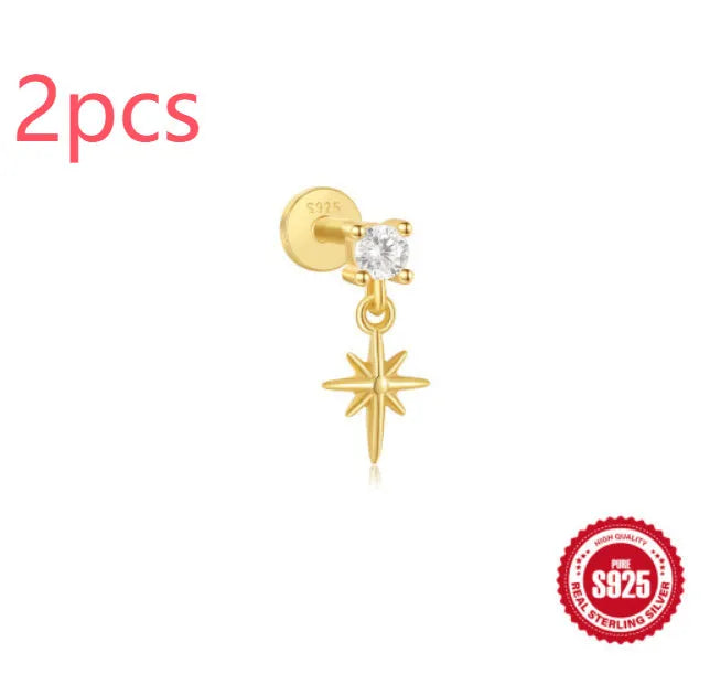 Sterling silver ear stud with a hanging gold-tone tassel charm on a white background.