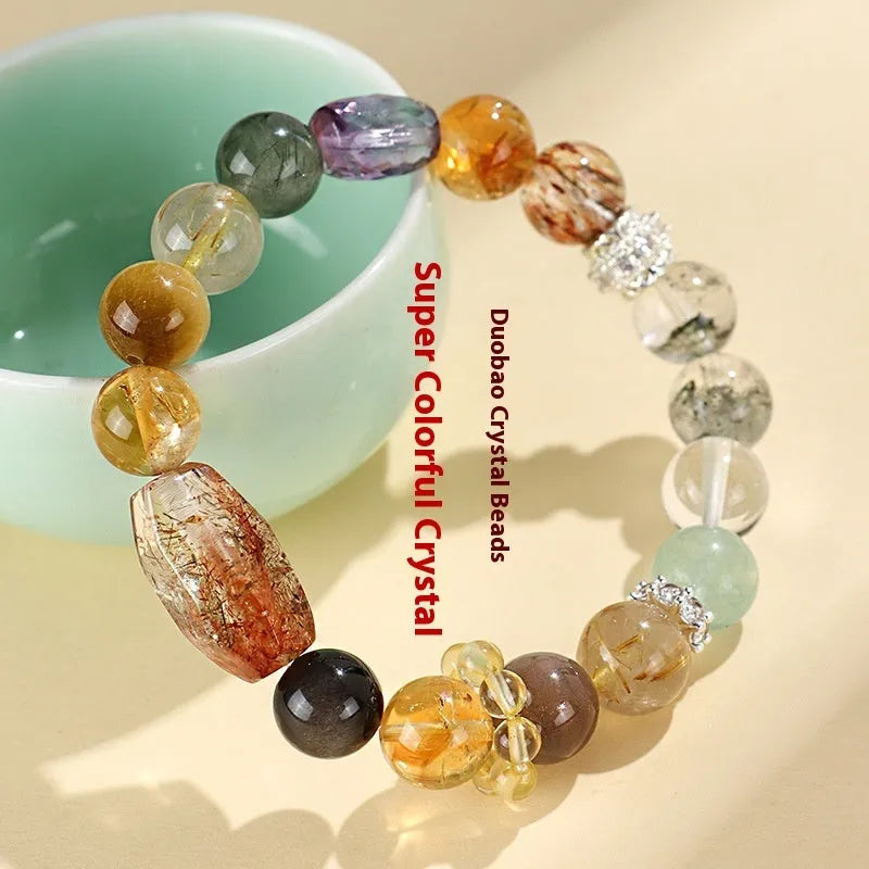 Handmade black and gold string bead bracelet made with natural Duobao crystal.