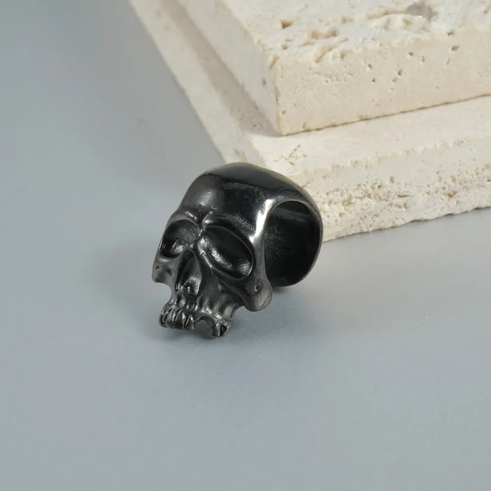 Stainless steel hollow skull Buddha earrings with electroplated colour options